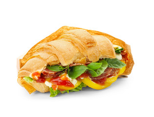 Tasty croissant sandwich with salami on white background