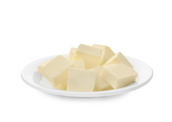 Plate with cubes of tasty fresh butter on white background