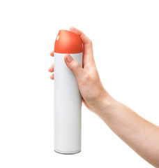 Woman holding spray air freshener on white background