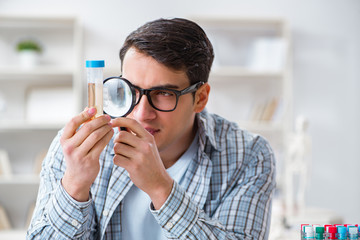 Medical student sitting at the lecture in university