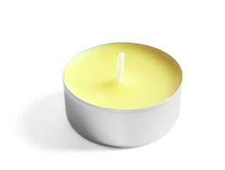 New small wax candle on white background