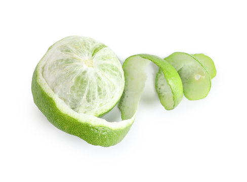 Fresh ripe lime with peel on white background