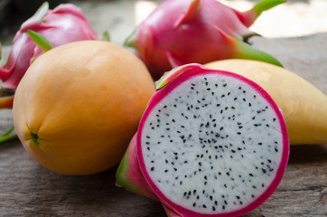 Dragon fruit on the old wood.