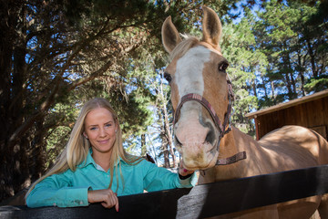 Young Woman and Palomino Horse