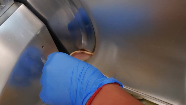 The mechanical cutting, ham is cut to the desired thickness