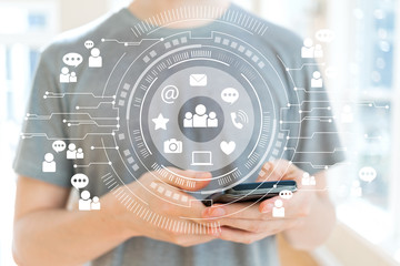 Social Media with young man using a smartphone