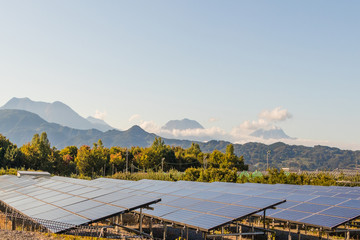 Solar power panels ,Photovoltaic modules for innovation green energy for life with blue sky background.