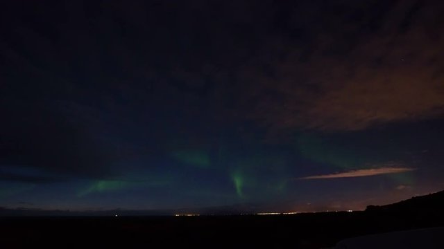 Aurora Borealis, northern light dancing in Iceland sky fast forward video 4k