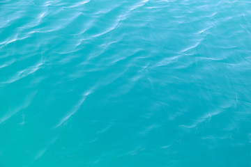Clear blue sea water surface in sunny day of summer.