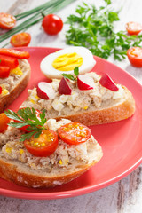 Mackerel or tuna fish paste sandwiches on glass plate