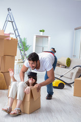 Young family moving to new apartment