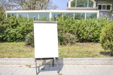 blank blackboard on the street with place for text.