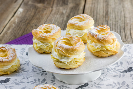 Four Small wreaths with whipped cream (traditional Czech dessert - "venecky")