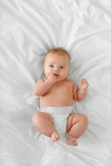 Portrait  baby on the bed - 205714801