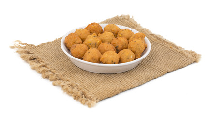Indian Spicy Street Food Dal Vada Also Know as Moong Dal Vada, Pakoda, Pakode, Pakore, Moong Vada, Pakora or Bhajiya isolated on White Background