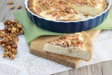 Slice of Rhubarb cake with caramelized almond krokant
