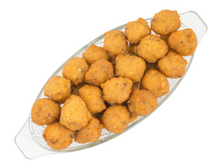 Indian Spicy Street Food Dal Vada Also Know as Moong Dal Vada, Pakoda, Pakode, Pakore, Moong Vada, Pakora or Bhajiya isolated on White Background