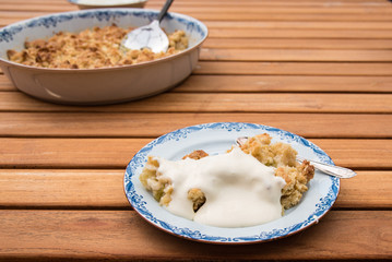 plate of rhubarb pie and custard sauce