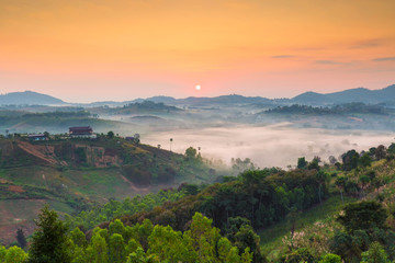 Beautiful Sunrise and foggy moutain view at Doi Ang Khang,Chiang Mai, Thailand.