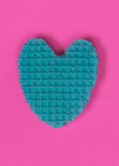 Creative heart from an edible wafer in pastel pink and blue colors. Abstraction. Template.