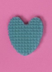 Creative heart from an edible wafer in pastel pink and blue colors. Abstraction. Template.