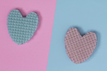 Creative heart from an edible wafer in pastel pink and blue colors. Abstraction. Template.