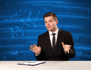 Stock data analyst in studio giving adivce on blue chart background concept on background