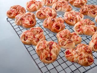 Baked pork sausage with mayonnaise bread on a wire cooking rack , for cooled before separate packing