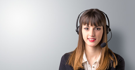 Young female telemarketer on a white background