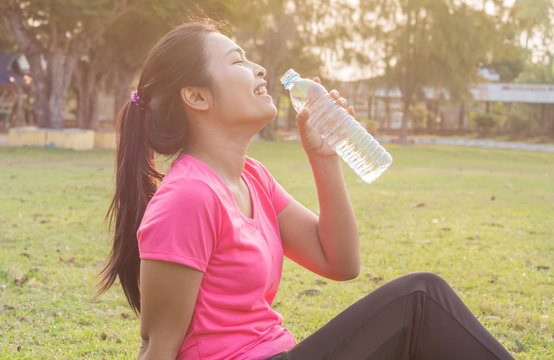 Women exercise with drinking water