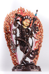 Red Tara in Vajrayogini's shape in a semi-angry form with the golden face and a knife cutting attachments. 