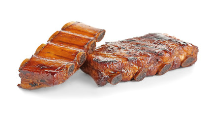 Delicious grilled ribs on white background