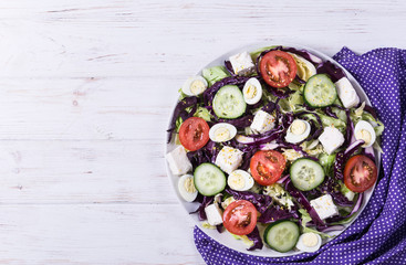 Salad with cabbage and quail eggs