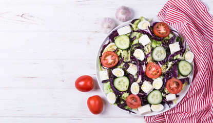 Salad with cabbage and quail eggs