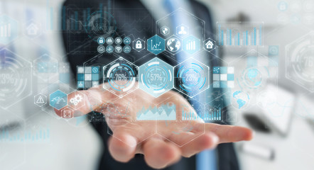 Businessman using holograms datas on digital screens 3D rendering