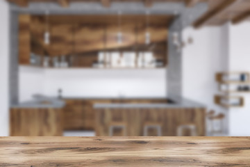 Wooden bar interior, stools and bottles blur