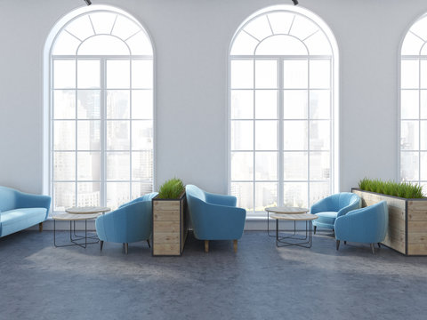 Arched window cafe interior, cyan armchairs