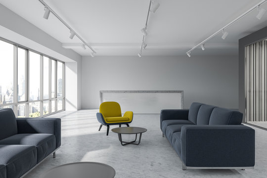 Office waiting room, yellow armchairs, reception