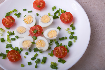 natural nutritious diet vegetable salad of tomatoes and quail eggs