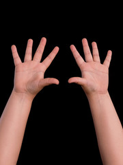 hands up of boy isolated on black background