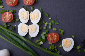 natural nutritious diet vegetable salad of tomatoes and quail eggs