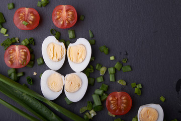 natural nutritious diet vegetable salad of tomatoes and quail eggs