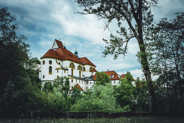 St. Mang's Abbey (Kloster Sankt Mang) in the historic old town of Füssen, a romantic medieval city on the Romantic Road in Bavaria, Germany