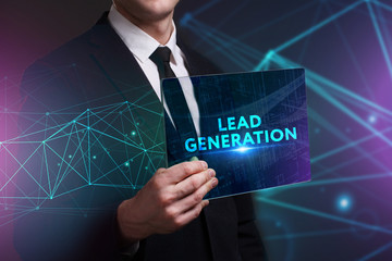 Business, Technology, Internet and network concept. Young businessman working on a virtual screen of the future and sees the inscription: Lead generation