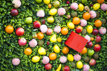 Fresh fruits. Apple, Orange, peach on grass background. Flat lay, top view