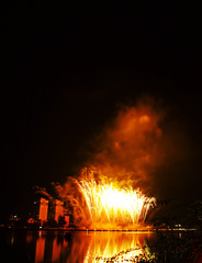Fototapeta na wymiar A fireworks display against the night sky. New year 2019