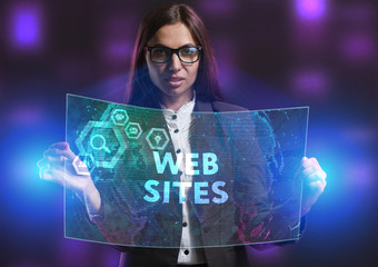 The concept of business, technology, the Internet and the network. A young entrepreneur working on a virtual screen of the future and sees the inscription: Web sites