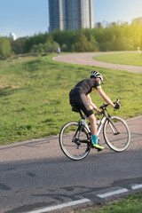Fototapeta premium Sport. road Bike cyclist riding single track. Vertical picture