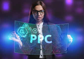 The concept of business, technology, the Internet and the network. A young entrepreneur working on a virtual screen of the future and sees the inscription: PPC