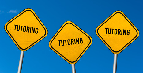tutoring - yellow sign with blue sky